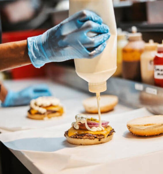 making-burgers-smaz-burger-box-du-cane-rd-london.jpg